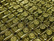 金價繼續小幅反彈 現貨黃金一度漲超2%刷新近兩日高點