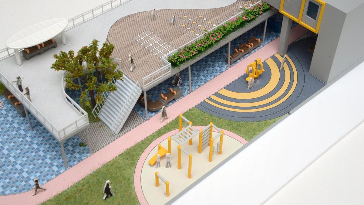 圖示空間例子模型「康健共樂空間」，設緩跑徑、健身設施、遊樂場、草地；以及因應居民需要可靈活擺放的座椅等，打造「健康活力」、「跨代共融」、「家社互聯」的綠色生活空間。